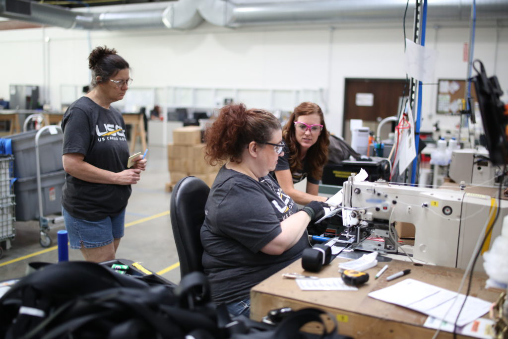 Manufacturing team members interacting