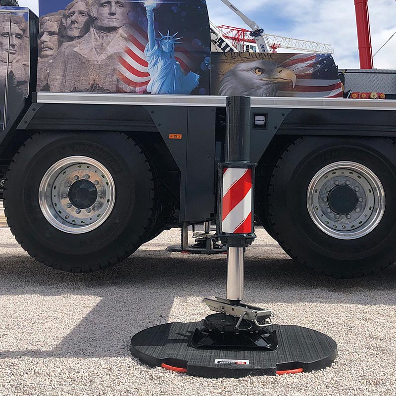 close up of crane outrigger pad in use