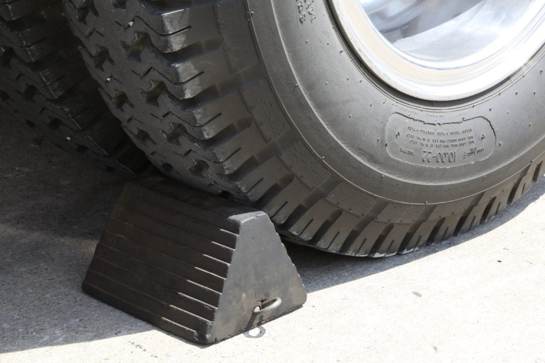 How to Use Wheel Chocks: The Basics, Proper Placement, and Regulations