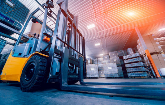forklift inside of warehouse