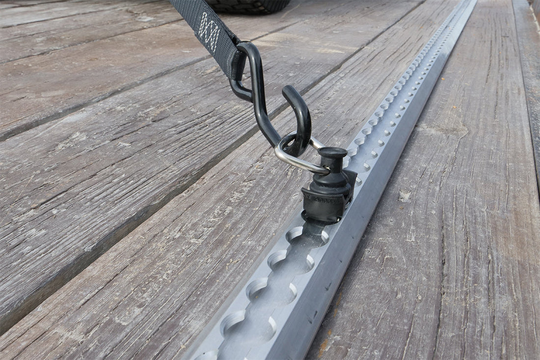 L-Track used with a single stud fitting connected to a tie down strap