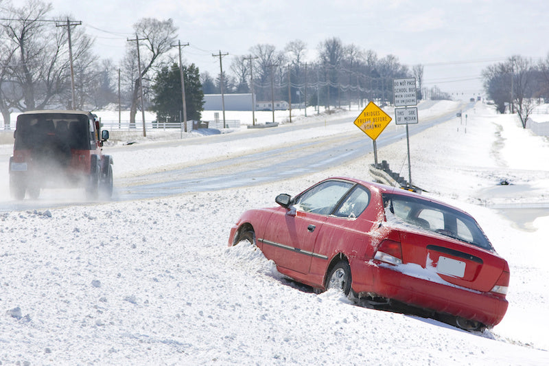 car stuck in snow needs recovery
