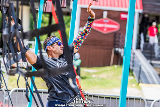 a contender climbing on heavy duty cargo net