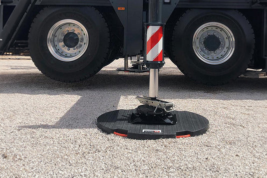 close up of crane outrigger pad in use