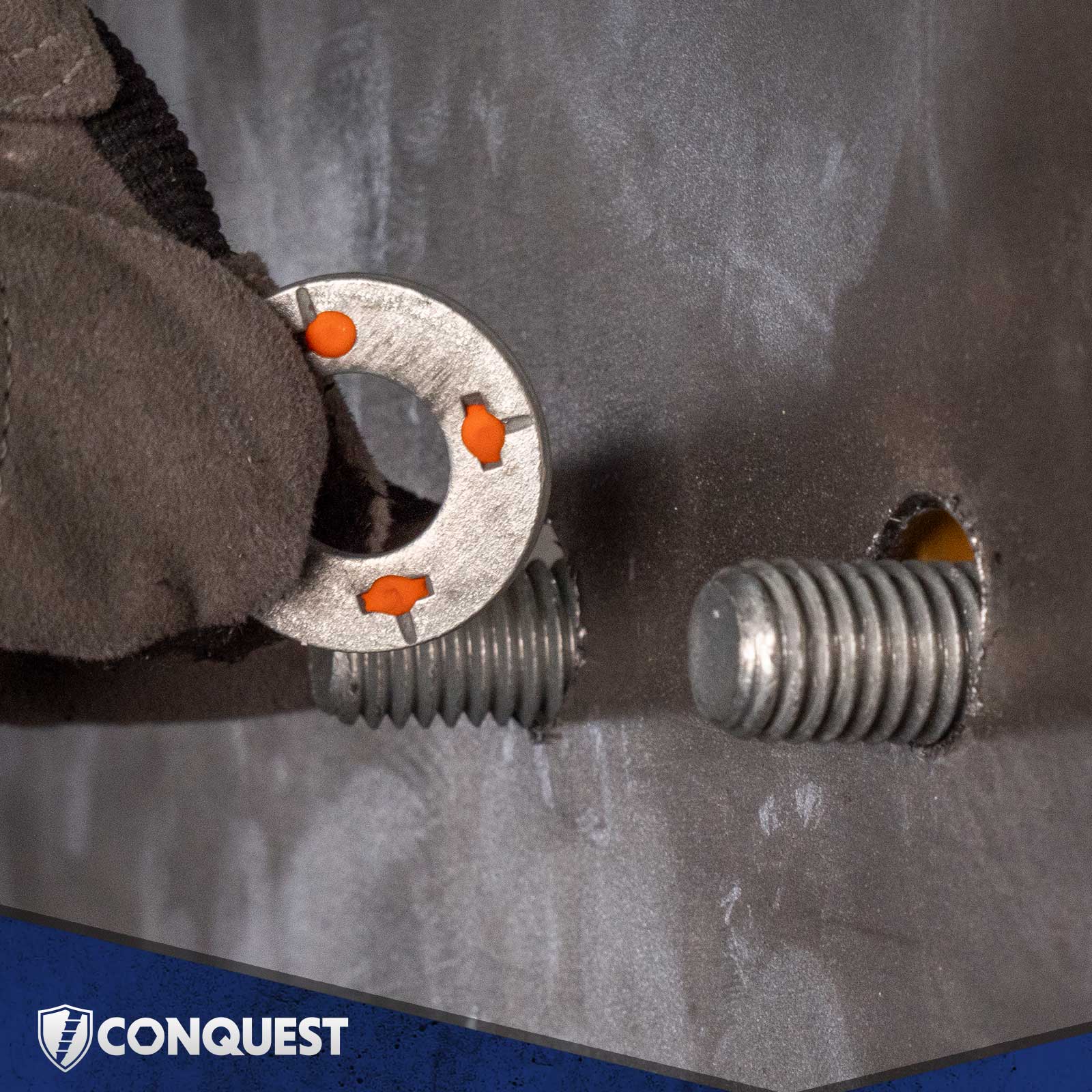 squirter washer being installed by a gloved hand