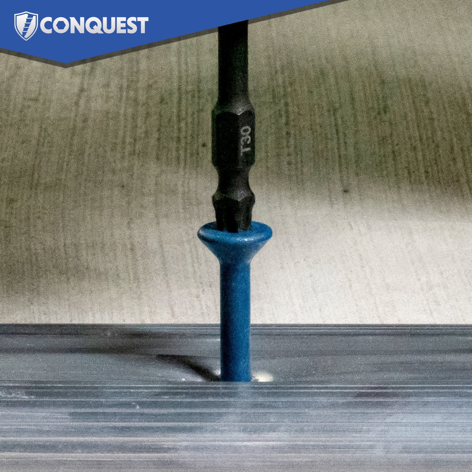 A close-up of a Conquest T30 hex bit with a blue concrete screw, shown inserted into a metal surface